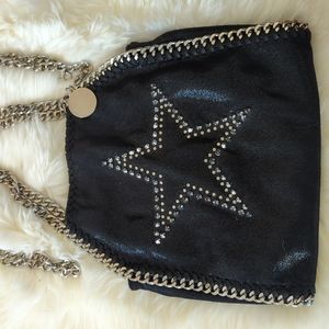 Small chain star studs embellished bag